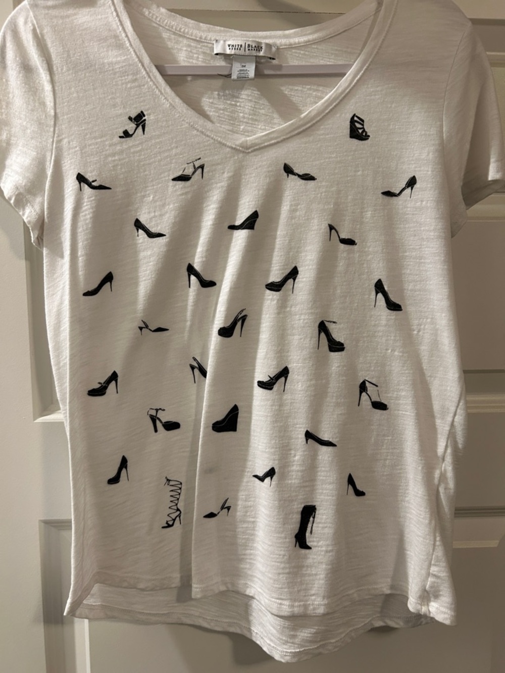 White House Black Market White V-Neck Tee with Black Heel Print